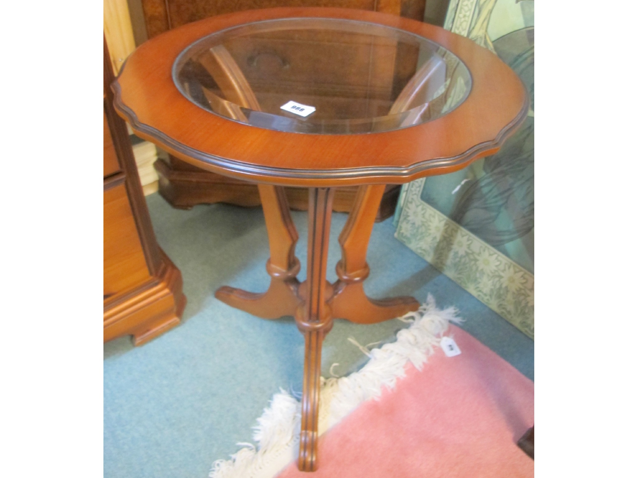 Appraisal: A round th Century hardwood table