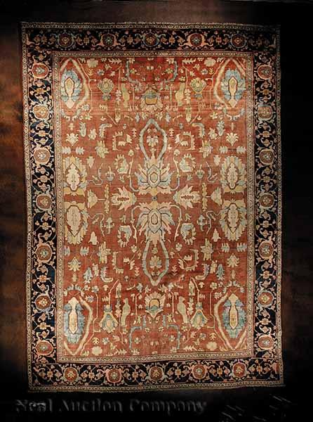 Appraisal: A Persian Serapi Carpet rust and blue ground overall stylized