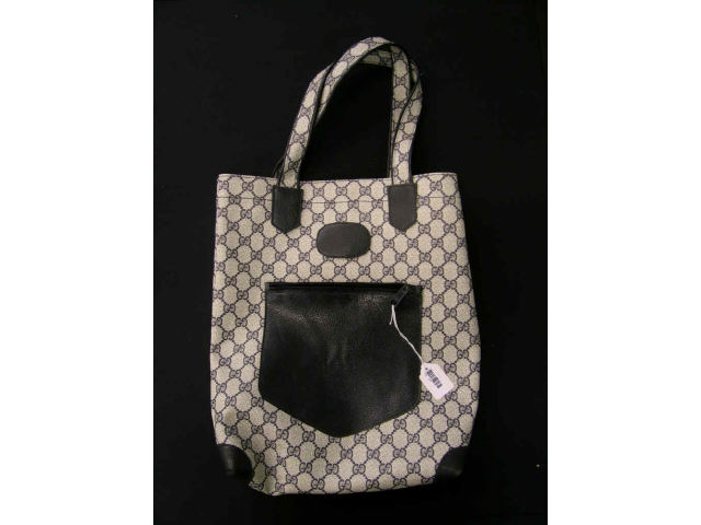 Appraisal: Gucci vinyl tote blue monogrammed vinyl exterior and interior zippered