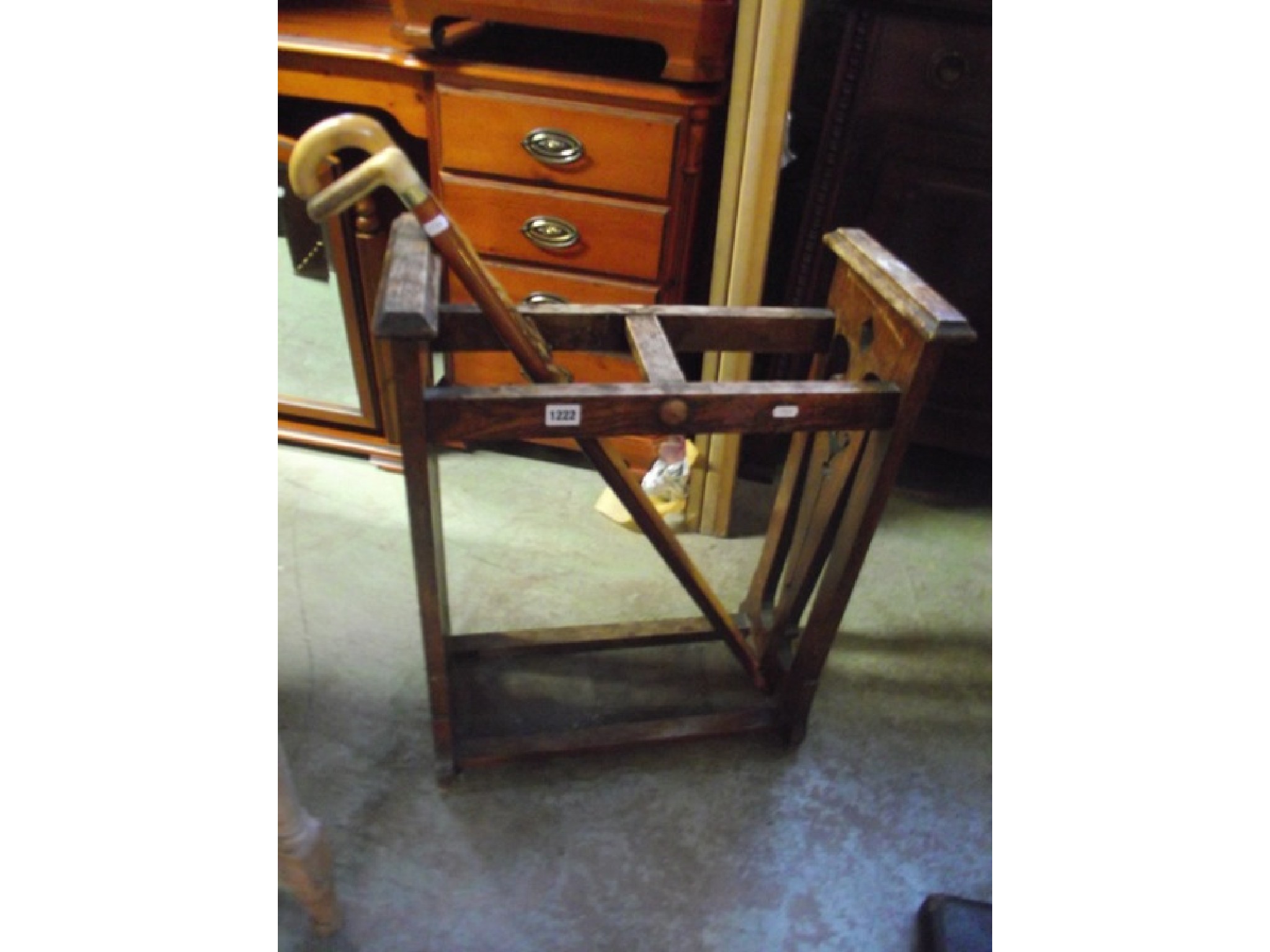 Appraisal: An early th century oak two divisional umbrella stickstand with