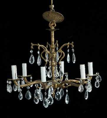 Appraisal: A Cast Brass Chandelier with Crystals The body of the