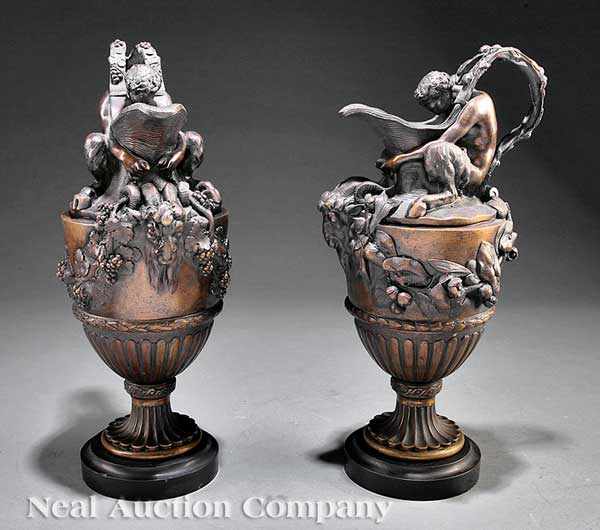 Appraisal: A Pair of Continental Patinated Bronze Figural Ewers each modeled