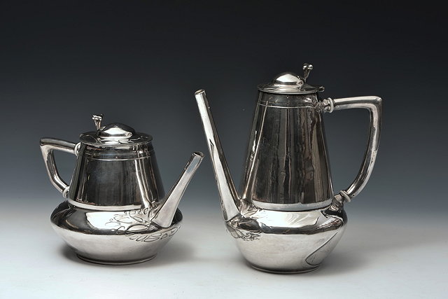 Appraisal: Urania of MaastrichtArt Nouveau pewter teapot and coffee pot probably