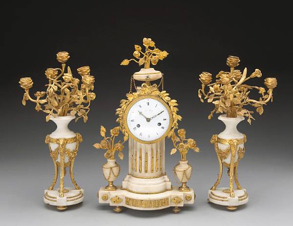 Appraisal: A Louis XVI style gilt bronze mounted assembled white marble