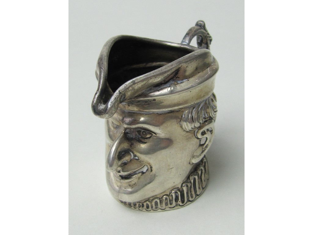 Appraisal: Small silver jug modelled as Punch's head London