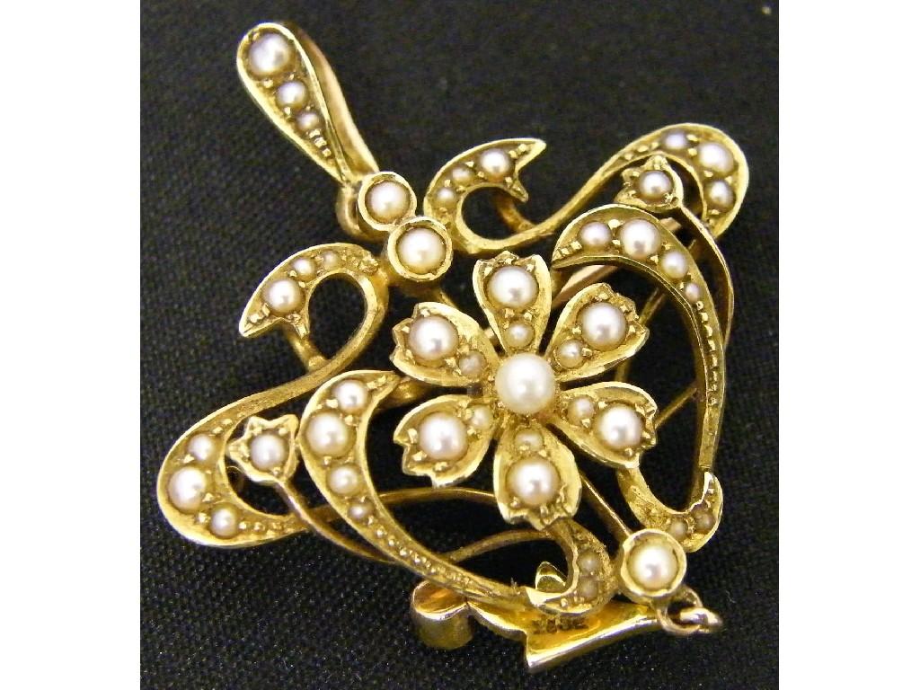 Appraisal: Attractive ct Art Nouveau pendant brooch set with seed pearls