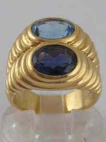 Appraisal: An carat gold blue topaz and amethyst ring by Bulgari