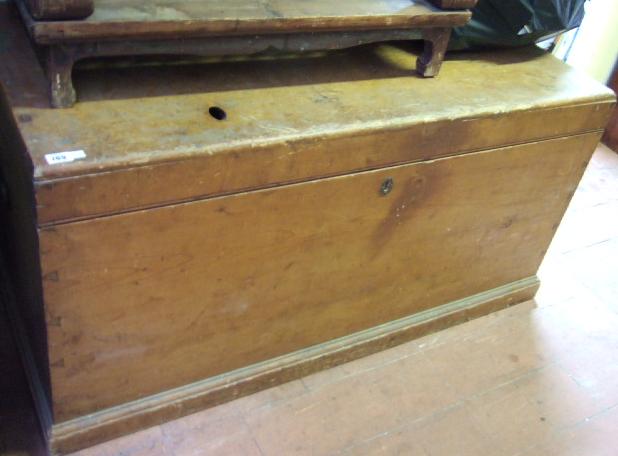 Appraisal: A Victorian pine trunk with wrought iron carry handles cm