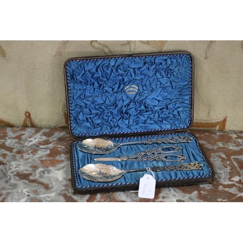 Appraisal: Bennett Brothers Silversmiths Liverpool cased Gothic grape shears and spoons