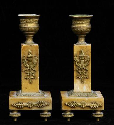 Appraisal: PAIR OF EMPIRE-STYLE GILT-METAL-MOUNTED SIENNA MARBLE SHORT CANDLESTICKS Each angular