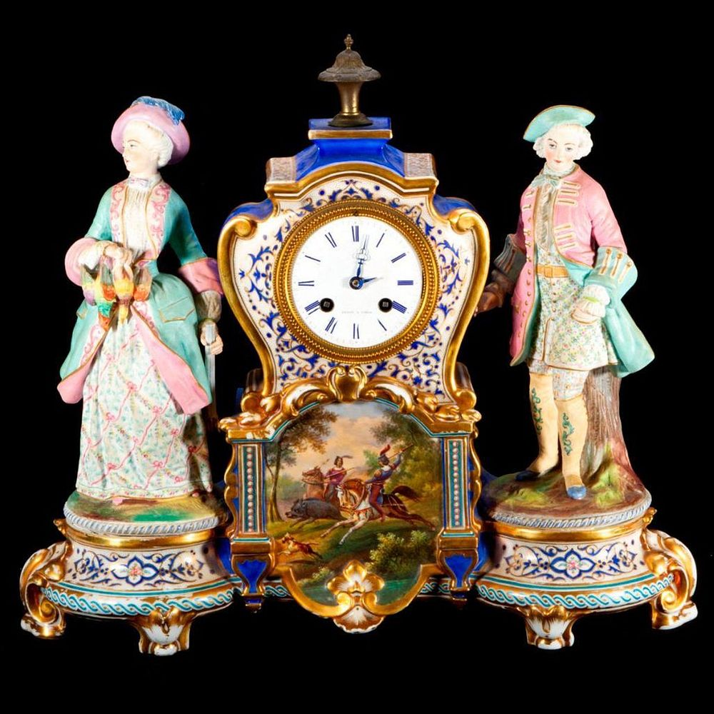 Appraisal: A continental porcelain clock A continental porcelain clock with figures