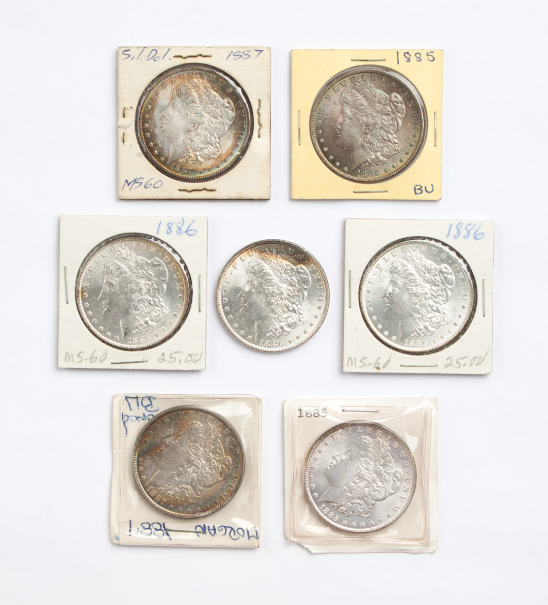 Appraisal: Seven U S Morgan type silver dollars - comprising two