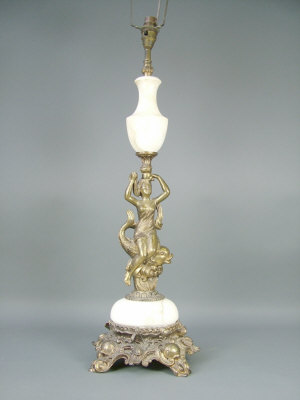 Appraisal: A Continental gilt and alabaster table lamp modelled as a