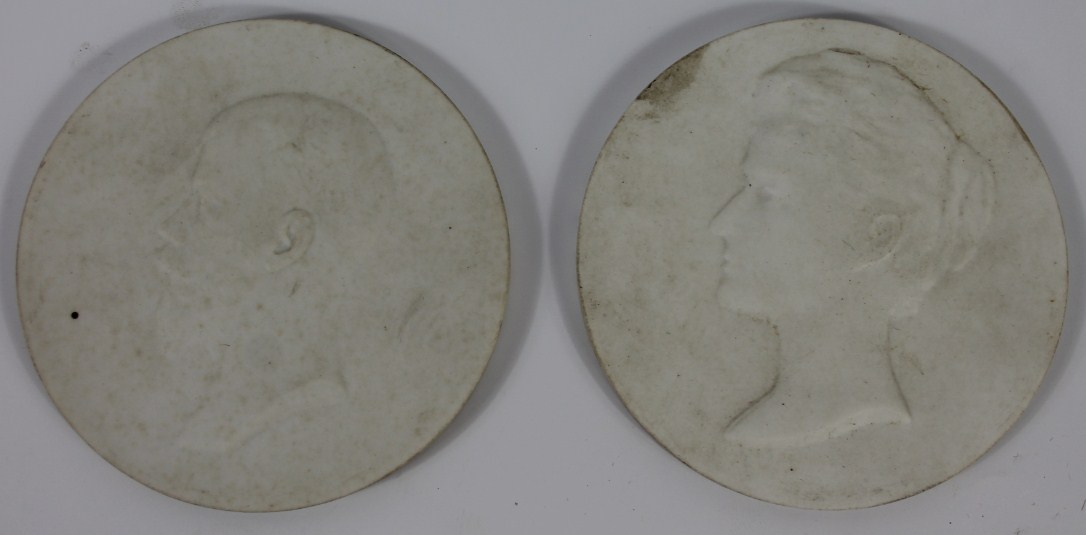 Appraisal: A pair of Continental early thC parian plaques decorated with