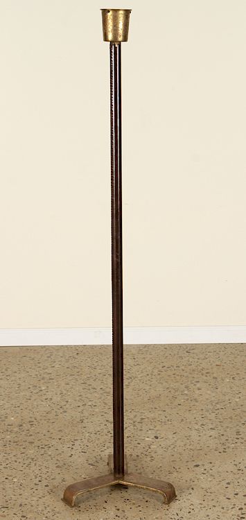 Appraisal: LEATHER BRONZE FLOOR LAMP MANNER JACQUES ADNET A leather and