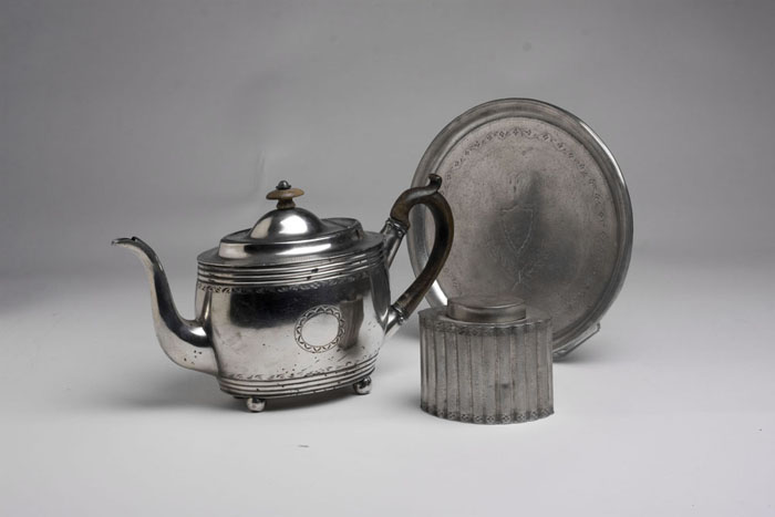 Appraisal: THREE PEWTER TABLEWARES SHEFFIELD ENGLAND Including an oval teapot marked