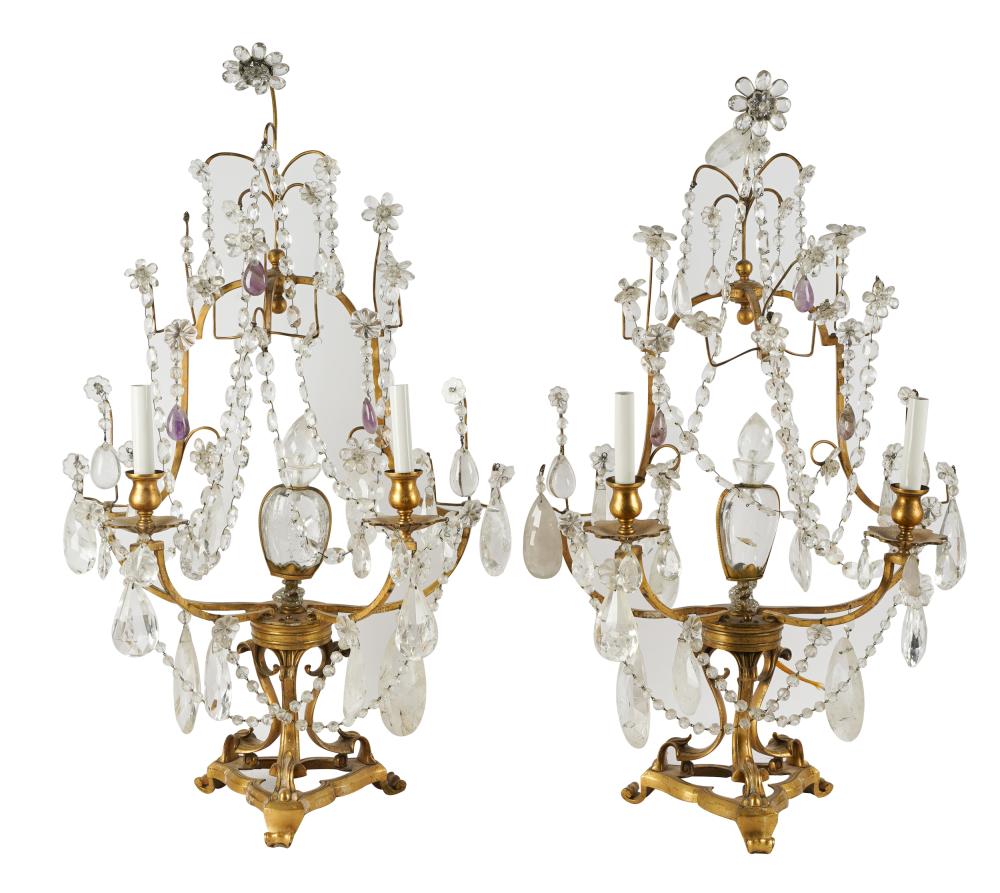 Appraisal: PAIR OF ROCK CRYSTAL TWIN-LIGHT GIRANDOLESgilt metal frames electrified Condition