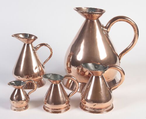 Appraisal: A matched graduated set of copper measures of haystack shape