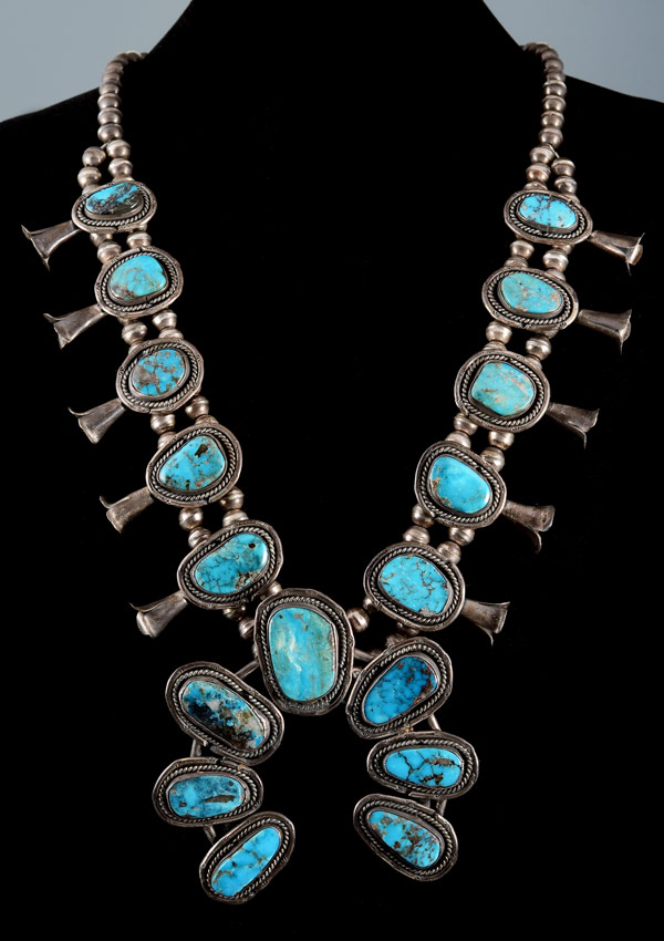 Appraisal: NATIVE AMERICAN SQUASH BLOSSOM NECKLACE Silver and turquoise unsigned ''