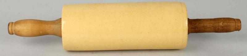 Appraisal: Yelloware Pottery Rolling Pin Description Wooden handles do not match