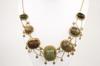 Appraisal: NECKLACE - Seven ancient Egyptian scarabs graduating in size from