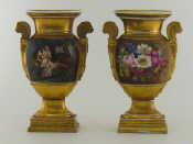 Appraisal: A pair of th century gilt oval baluster porcelain vases