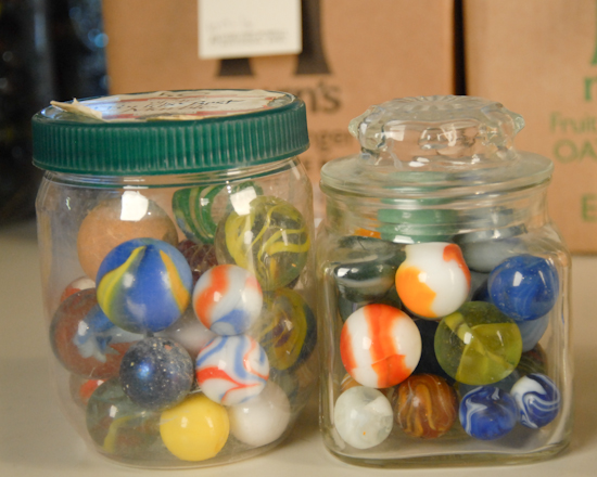 Appraisal: Two Small Containers of Marbles and Shooters