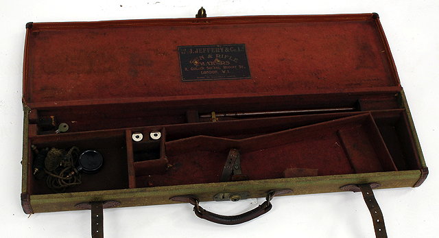 Appraisal: AN OLD CANVAS AND LEATHER MOUNTED -BORE GUN CASE with