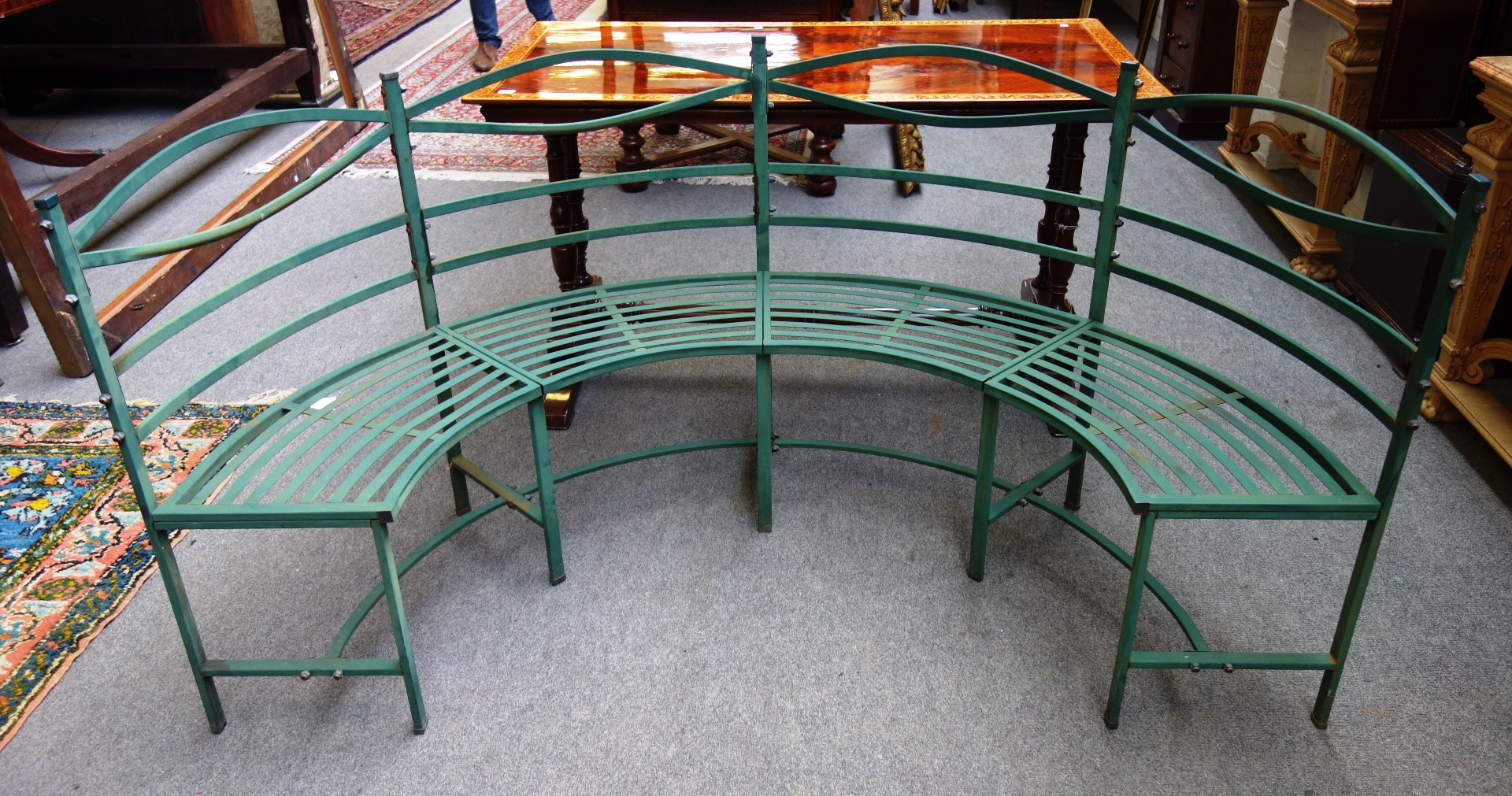 Appraisal: A Regency design green painted metal garden bench of semi