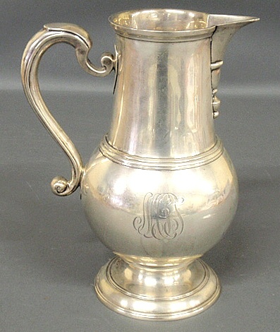 Appraisal: - Large sterling silver water pitcher with an ear-shaped handle