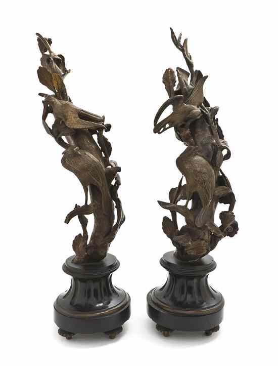 Appraisal: A Pair of Continental Bronze and Marble Models of Birds