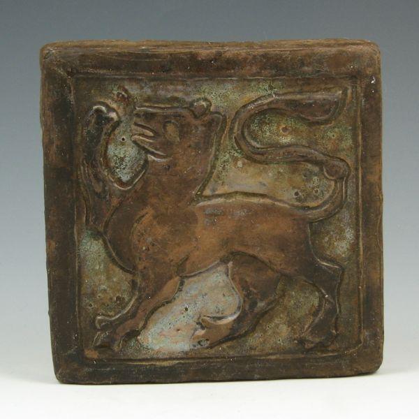 Appraisal: Pewabic tile with a stylized mythical lion creature in matte