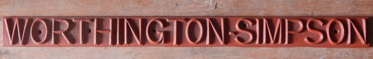 Appraisal: A cast iron Worthington's Simpson name plate with raised lettering