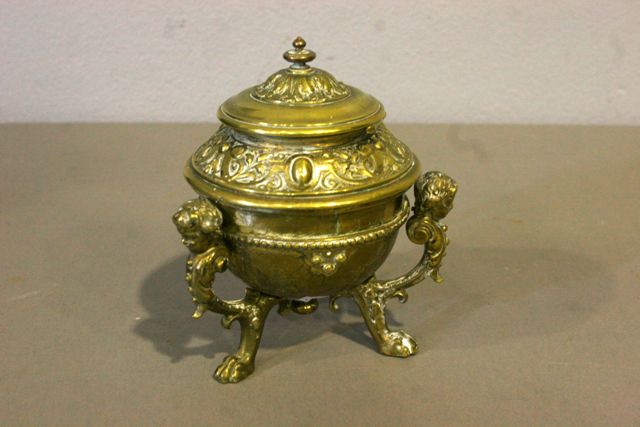 Appraisal: A th century brass ink well with scroll and cabachon