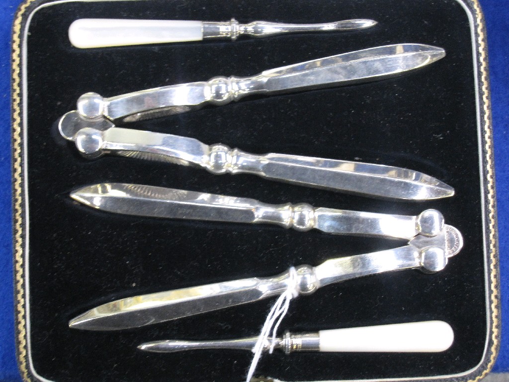 Appraisal: EP and mother of pearl nutcracker and pick set