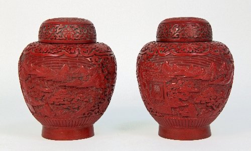 Appraisal: A pair of Chinese cinnabar red lacquer baluster jars and