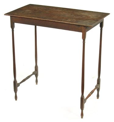 Appraisal: A George III mahogany occasional table the rectangular top on