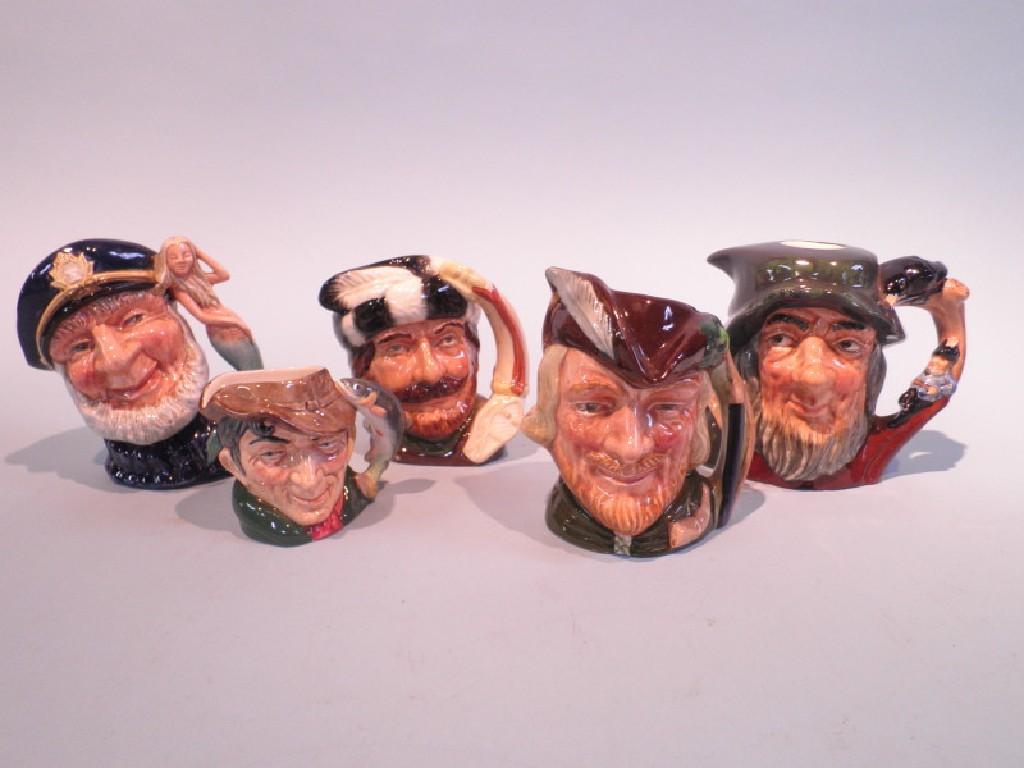 Appraisal: Four medium sized Royal Doulton character jugs Robin Hood Old