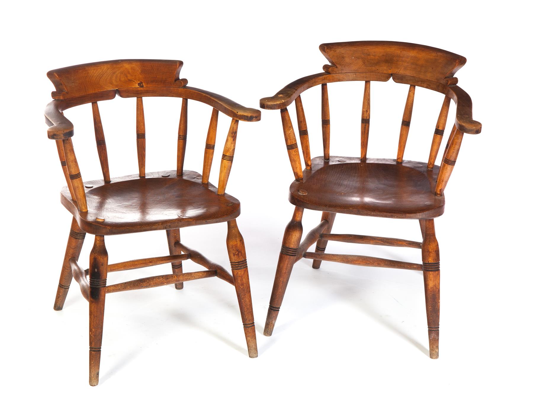 Appraisal: PAIR OF ENGLISH CAPTAIN'S WINDSOR ARMCHAIRS Mid th century mixed