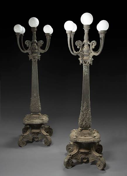 Appraisal: A pair of Renaissance style patinated bronze garden torch res