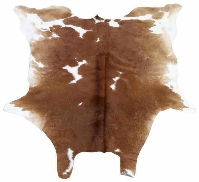 Appraisal: Cowhide reddish brown white largest measurements approx x