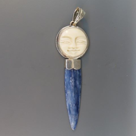 Appraisal: Sterling Pendant carved round face and blue stone long