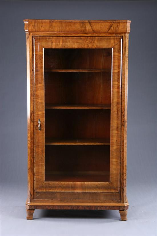 Appraisal: BIEDERMEIER STYLE CABINET late th century walnut Ogee molded crown