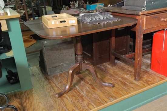 Appraisal: TILT TOP TEA TABLE Walnut with rounded corners turned pedastal