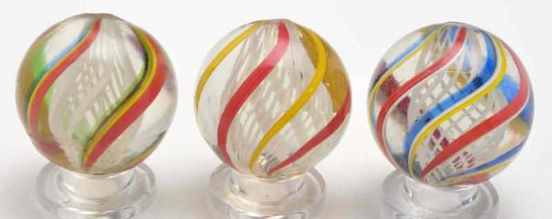 Appraisal: Lot of White Latticino Swirl Marbles Description Nice set of