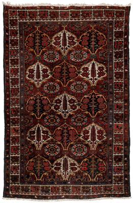 Appraisal: Baktiari rug repeating designs on dark burgundy field cartouches with