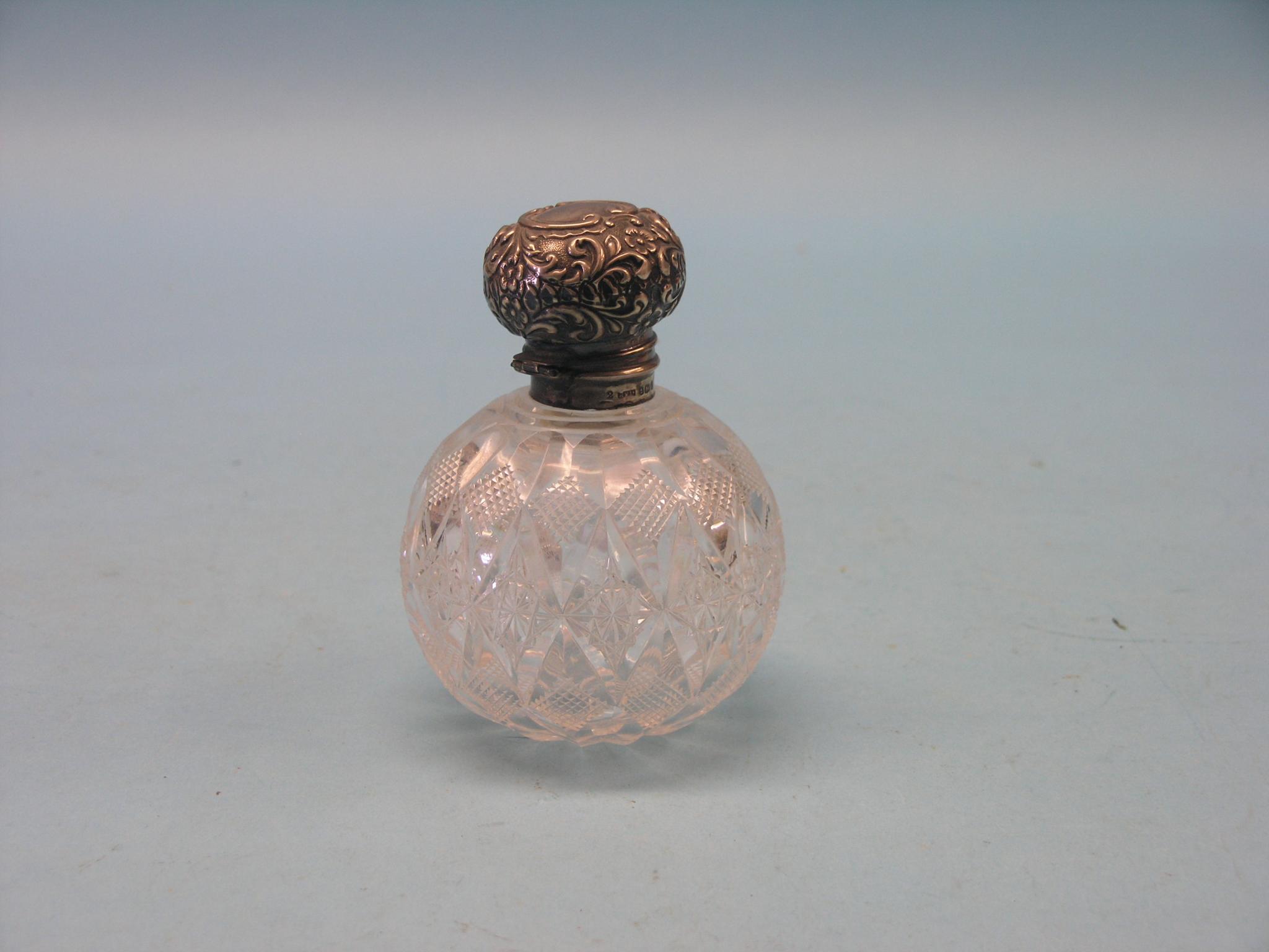 Appraisal: A silver-mounted cut glass scent bottle with stopper Birmingham in