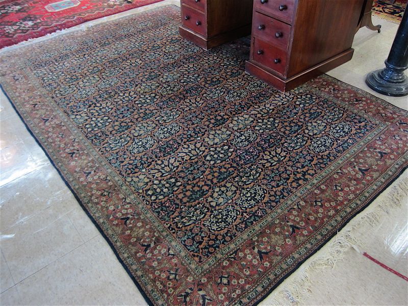 Appraisal: HAND KNOTTED ORIENTAL CARPET Persian Hereke design of repeating bands