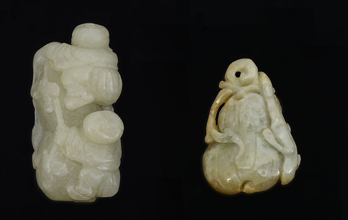 Appraisal: CHINESE CARVED JADE PENDANTS carved jade or similar stone carved