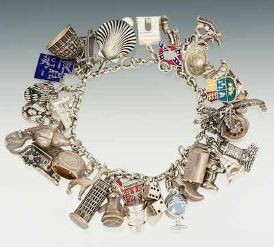 Appraisal: A Sterling Silver Charm Bracelet Sterling silver link bracelet with